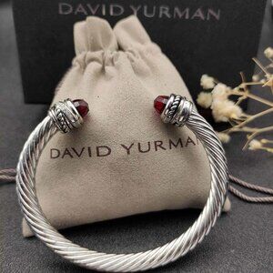 Sterling and gold David Yurman twisted cable cuff bracelet with garnet stones